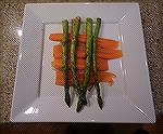 Bed of charred white onions, carrots and grilled asparagus