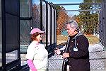 Platform Tennis Ribbon Cutting ceremony. 11/28/2017. Worcester County Commissioner Chip Bertino talks with paddle ball player.