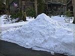 Snow pile at the Barnes home left from the great blizzard of 2018.