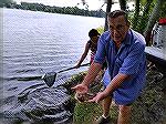 Lee Phillips aides Maryland DNR in stocking 500 bluegills for one of the Kids Fishing event hosted by Ocean Pines Anglers Club.