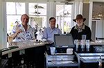 Jack Barnes, Joe Reynolds and Jeff Knepper enjoy a libation at the Yacht Club.