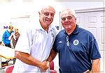 Maryland State Senator Jim Mathias and Worcester County Commissioner Jim Bunting shake hands at recent Town Hall Meeting held by Commissioner Chip Bertino at the Ocean Pines Library.