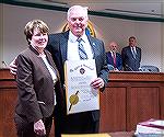 County Commissioner Jim Bunting and his wife at the swearing-in ceremony for County Commissioners on December 4, 2018.