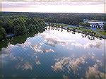 Very early this morning, the air was calm and the Southgate Pond reflected the clouds in the sky perfectly.  