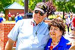 Reggie Mason and Anna Foltz pose for photograph at conclusion of Memorial Day Ceremony, 2019. Mason delivered the keynote address.