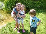 Anastasia & Mom show their catch to brother Tony at Ocean Pines Anglers Club, Teach A Kid To Fish event.