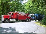 Trash Hauler gets a tow after breakdown in the Pines.