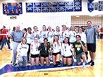 Coach Jim Barnes, son of OP residents Jack & Andrea Barnes, and coach of the Indian River Girls volleyball team is shown on far right with the team after snapping Smyrna's 4 year streak and winning th
