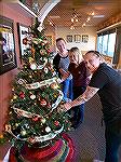 Denovos crew trims the tree for Christmas 2019. Denovos is my favorite local restaurant. 