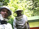 Jack Barnes III, Southwest Airlines pilot, demonstrates outfit for his hobby bee keeping business.