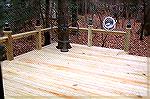 Rear deck installation with premium pressure treated lumber.