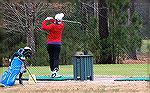 Young golfer hitting a few on the Ocean Pines driving range.