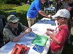 Ocean Pines Angler Club member Buddy Seigel demonstrates knot tying to aspiring young anglers.