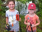 Maya Jamieson and Zoe Duncan L to R winners of largest and most fish in 4-7 age group at Ocean Pines Anglers Club Art Hansen Memorial Youth Fishing Contest.