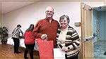 Larry Perrone receives an appreciation gift from Veterans Memorial president Marie Gilmore for his service on the Memorial's Board of Directors.