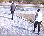 Couple leaving my property carrying piece of vinyl siding 2/11/23 about 10:46 am