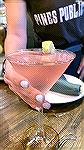 Server delivers a Cosmo at Pines Public House. 