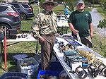 April 22, 2023. Ocean Pines Anglers First Annual Flea Market. Vendor Larry Hughes on left and Event Chair Jerry Leuters on right. 
