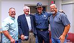 Commissioner Bertino Town Meeting. 
Left to right:
OPA board member John Latham, County Commissioner Jim Bunting, Worcester County Sherriff Matthew Crisafulli, and board president Rick Farr.