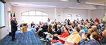 OPA General Manager John Viola waves to crowd of over 150 people after introduction by County Commissioner Chip Bertino.