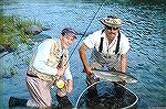 Joe Reynolds (left) and guide. Atlandtic salmon catch on York River at Gourmet Salmon Lodge controlling four miles of the river's best fishing.