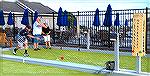 Players enjoy the new bocce ball courts at the Oceaan Pines Yacht Club.